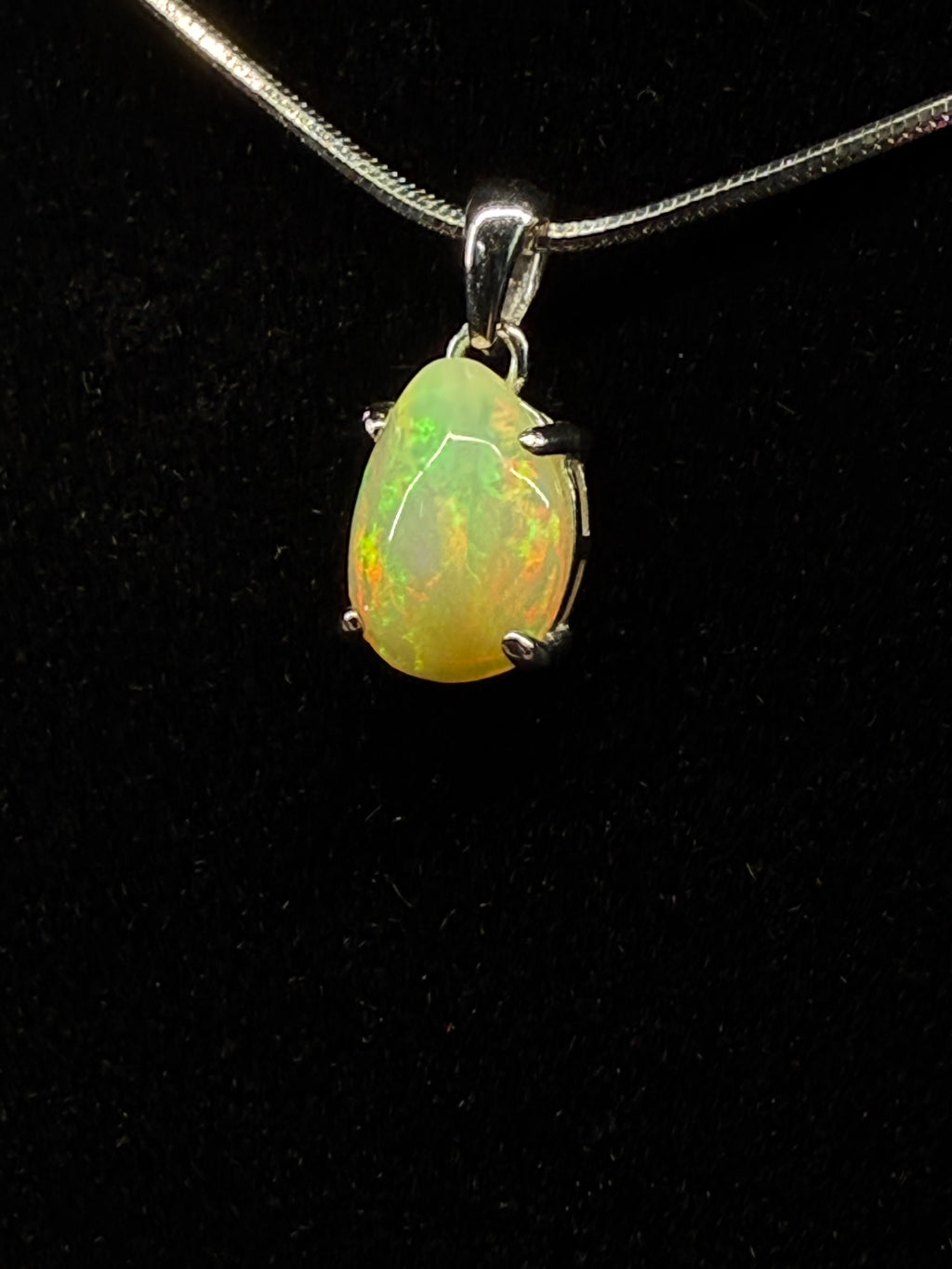 Egg Shaped Etheopian Opal Pendant