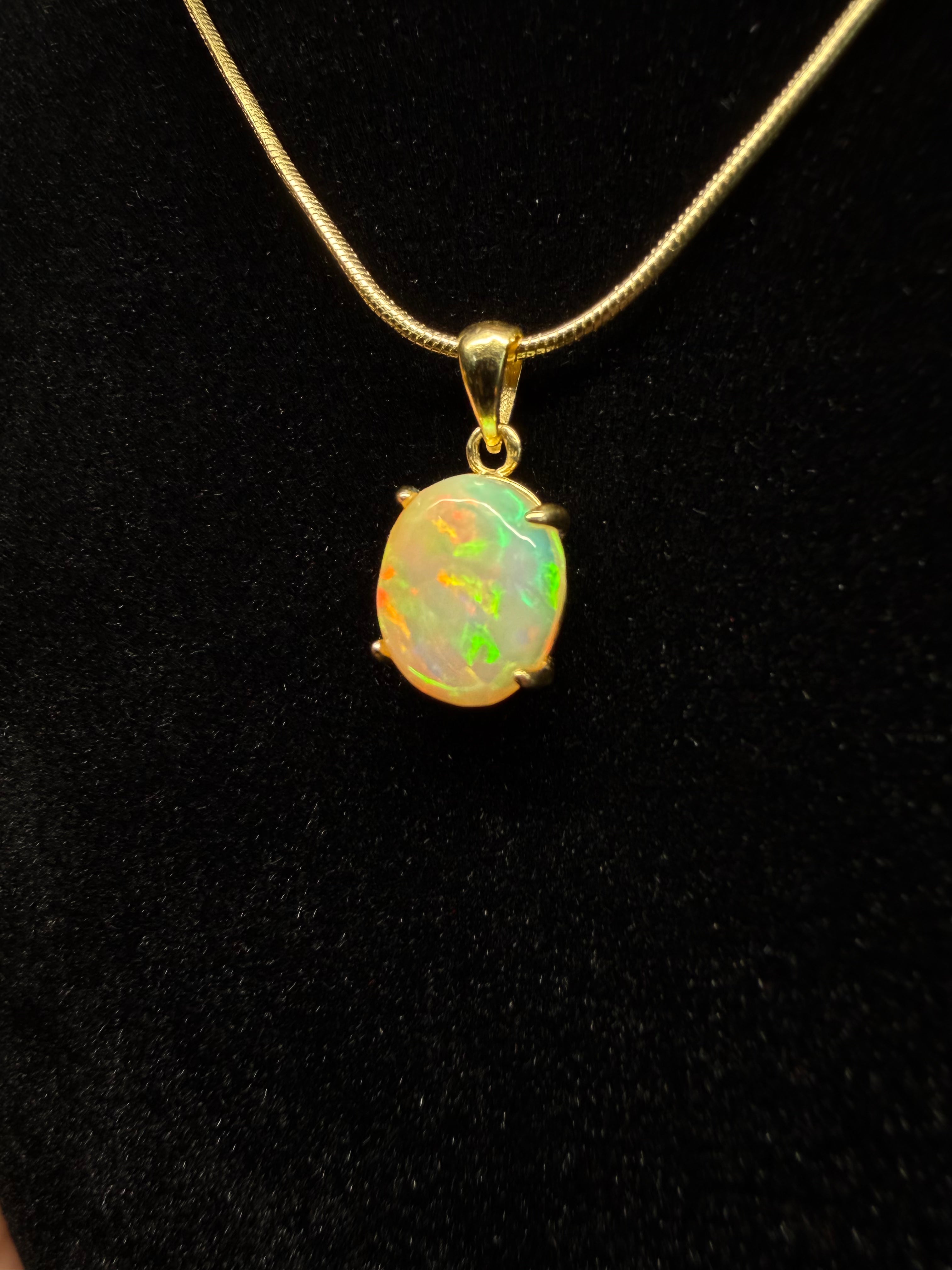 Oval Ethiopian Opal Gold Plated Pendant