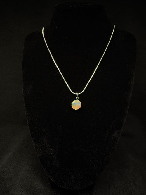 Circular Ethiopian Opal Pendant