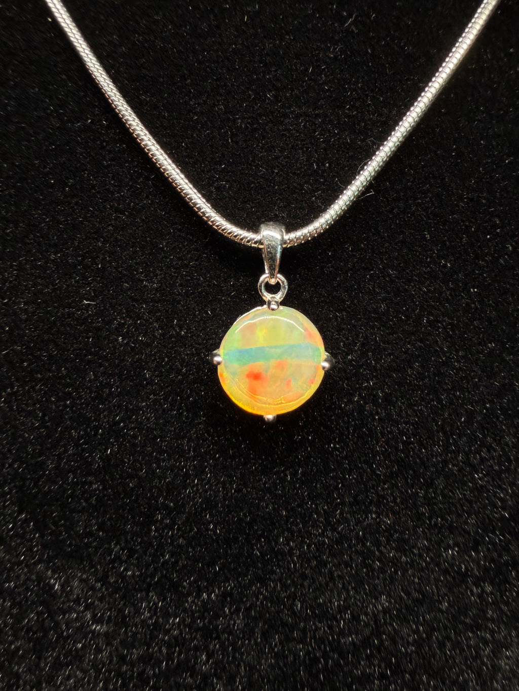 Circular Ethiopian Opal Pendant