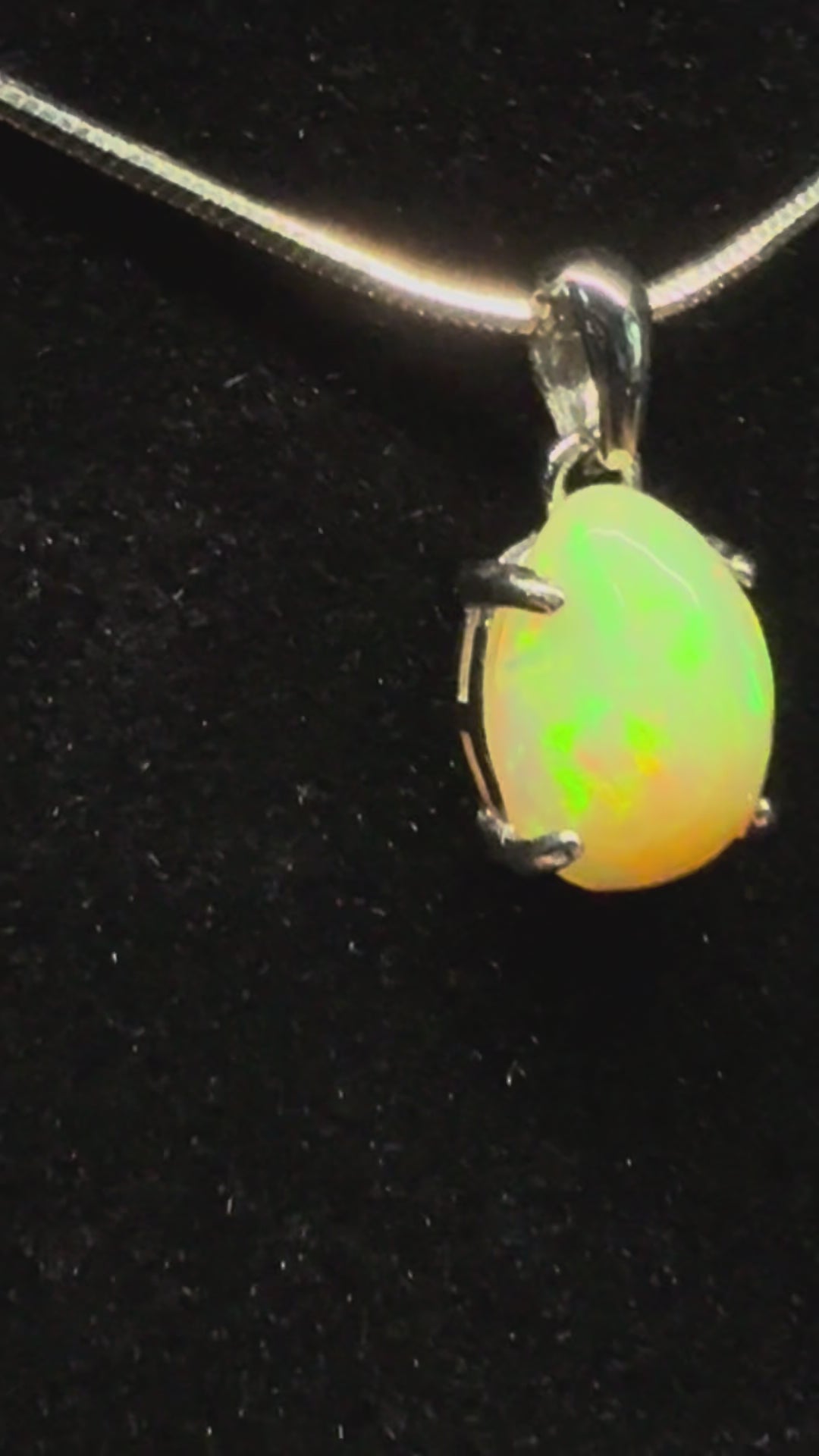 Egg Shaped Etheopian Opal Pendant
